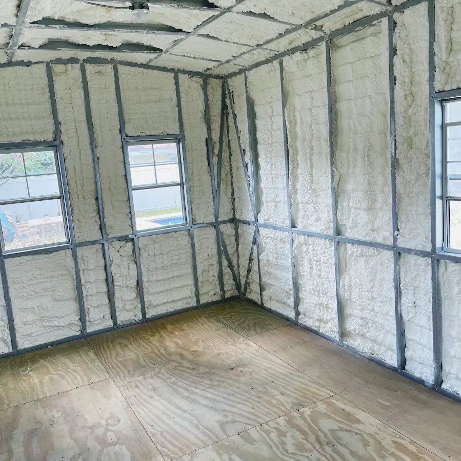 Closed-cell spray foam insulation applied to wall cavities in a residential project in Muskego